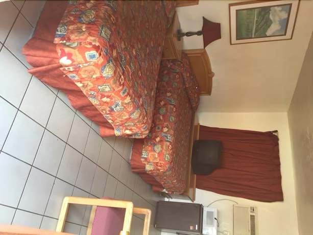 Imagen de la habitación del Hotel Sunland Motel. Foto 4