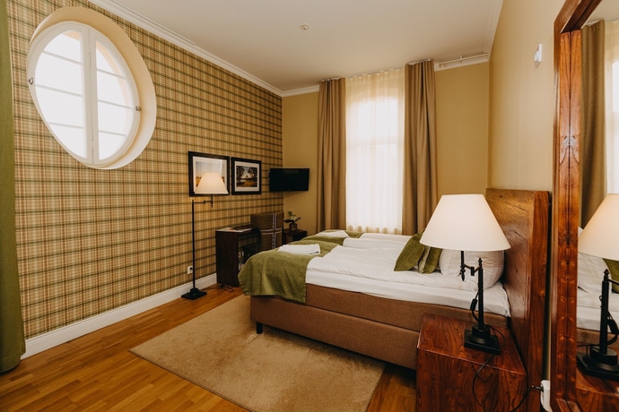 Imagen de la habitación del Hotel Sunlight Conference and Spa. Foto 17