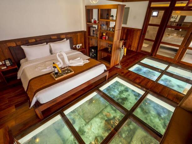 Imagen de la habitación del Hotel Sunlight Eco Tourism Island Resort. Foto 16