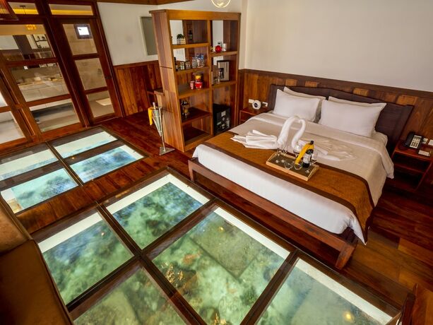 Imagen de la habitación del Hotel Sunlight Eco Tourism Island Resort. Foto 19