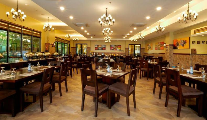 Imagen del bar/restaurante del Hotel Sunlight Guest Hotel - Coron. Foto 3