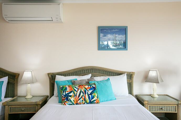 Imagen de la habitación del Hotel Sunlit Waters Studio Apartments. Foto 15