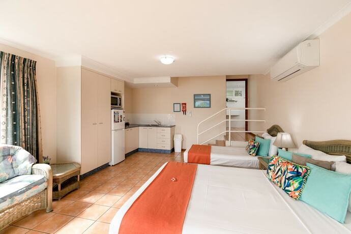 Imagen de la habitación del Hotel Sunlit Waters Studio Apartments. Foto 18