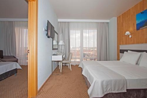 Imagen de la habitación del Hotel Sunmarinn Resort All Inclusive. Foto 9