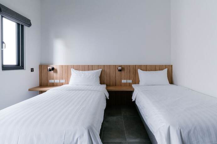 Imagen de la habitación del Hotel Sunmiao Inn. Foto 15