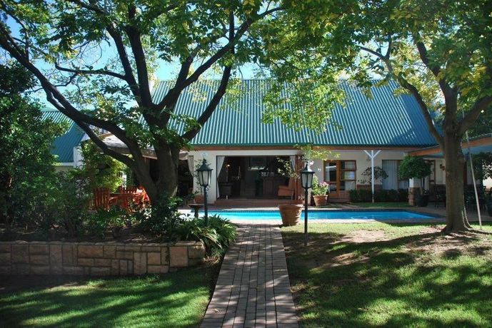 Imagen de la habitación del Hotel Sunninghill Guest Lodge. Foto 9