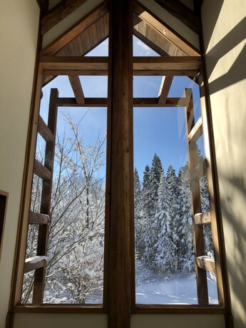 Imagen de la habitación del Hotel Sunnsnow Log House. Foto 18
