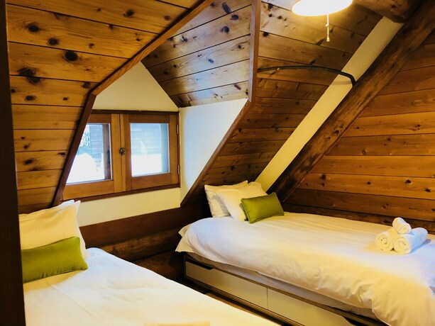Imagen de la habitación del Hotel Sunnsnow Log House. Foto 19
