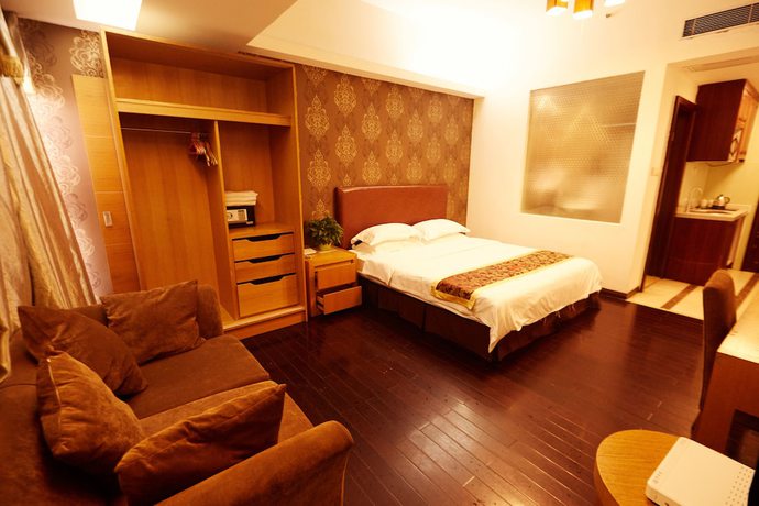 Imagen de la habitación del Hotel Sunny Apartment - Guangzhou Beijing Road Jinyuan. Foto 2