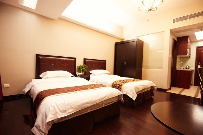 Imagen de la habitación del Hotel Sunny Apartment - Guangzhou Beijing Road Jinyuan. Foto 8