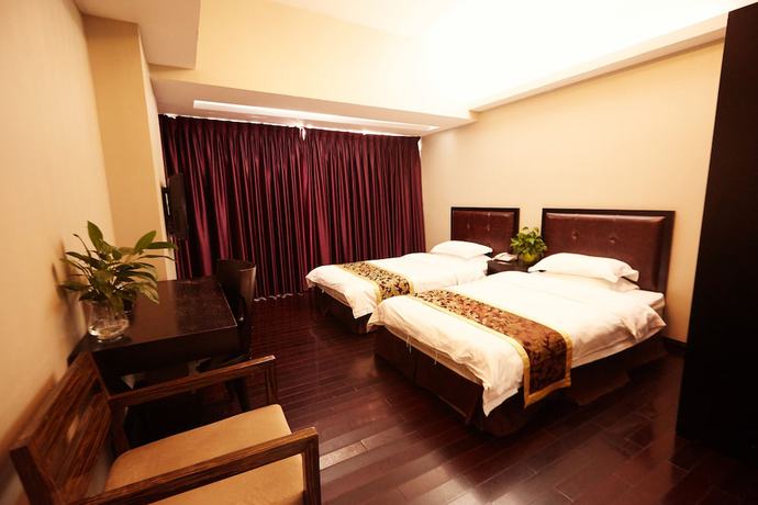 Imagen de la habitación del Hotel Sunny Apartment - Guangzhou Beijing Road Jinyuan. Foto 11