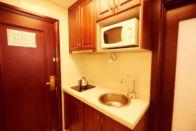 Imagen de la habitación del Hotel Sunny Apartment - Guangzhou Beijing Road Jinyuan. Foto 15
