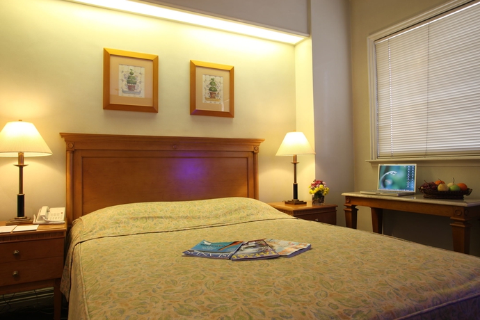 Imagen de la habitación del Hotel Sunny Bay Suites. Foto 8