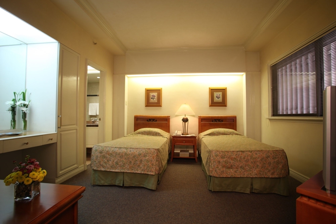 Imagen de la habitación del Hotel Sunny Bay Suites. Foto 11