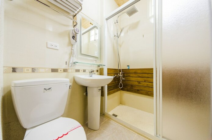 Imagen de la habitación del Hotel Sunny Breeze Garden. Foto 13