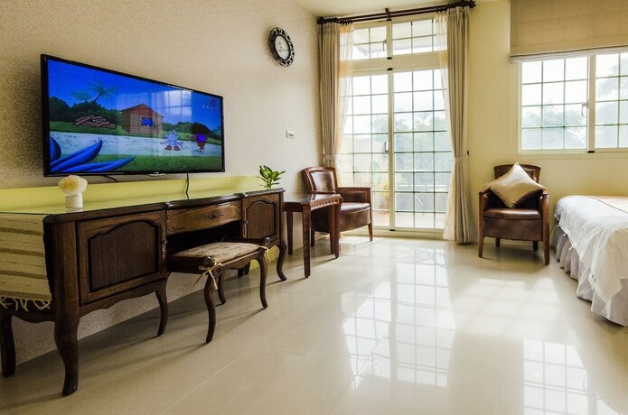 Imagen de la habitación del Hotel Sunny Breeze Garden. Foto 16