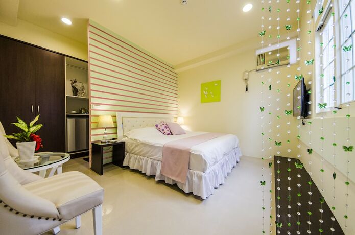 Imagen de la habitación del Hotel Sunny Breeze Garden. Foto 17