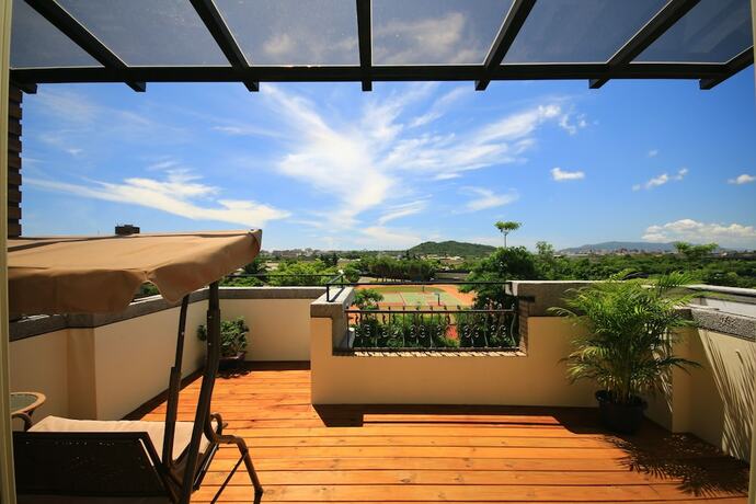 Imagen de la habitación del Hotel Sunny Breeze Garden. Foto 19