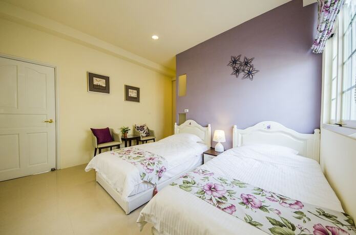Imagen de la habitación del Hotel Sunny Breeze Garden. Foto 21