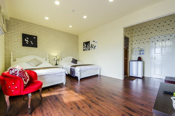 Imagen de la habitación del Hotel Sunny Breeze Garden. Foto 24