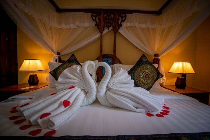 Imagen de la habitación del Hotel Sunny Palms Beach Bungalows. Foto 14