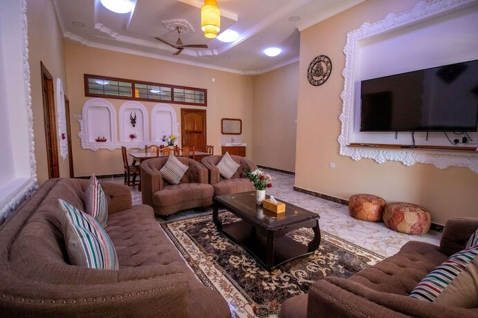 Imagen de la habitación del Hotel Sunny Palms Beach Bungalows. Foto 17