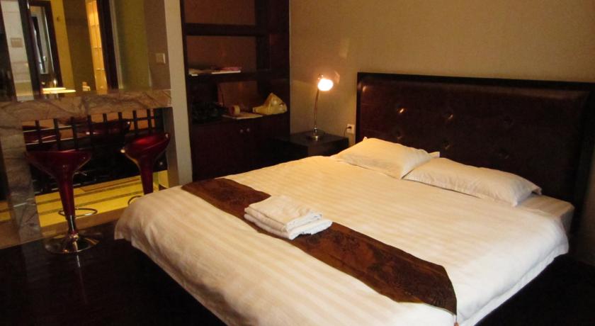 Imagen de la habitación del Hotel Sunny Private Apartment Hotel Of Grand Continental. Foto 2