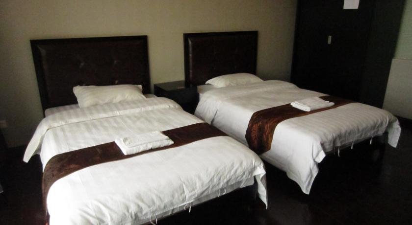 Imagen de la habitación del Hotel Sunny Private Apartment Hotel Of Grand Continental. Foto 3