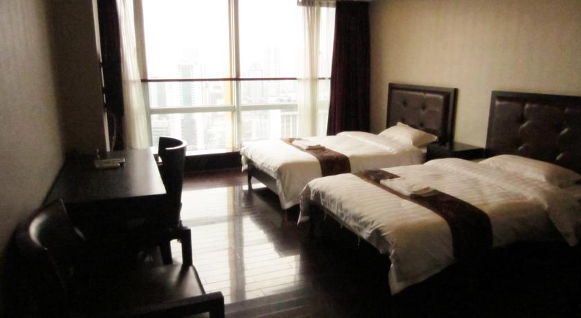 Imagen de la habitación del Hotel Sunny Private Apartment Hotel Of Grand Continental. Foto 5