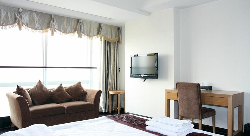 Imagen de la habitación del Hotel Sunny Private Apartment Hotel Of Grand Continental. Foto 6