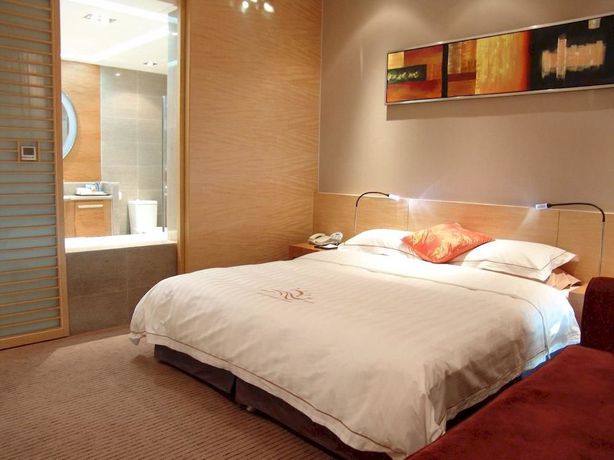 Imagen de la habitación del Hotel Sunny Resort - Dandong. Foto 5