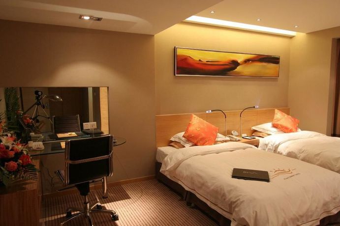 Imagen de la habitación del Hotel Sunny Resort - Dandong. Foto 7