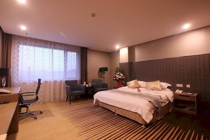 Imagen de la habitación del Hotel Sunny Resort - Dandong. Foto 11