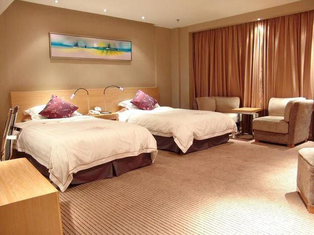 Imagen de la habitación del Hotel Sunny Resort - Dandong. Foto 12