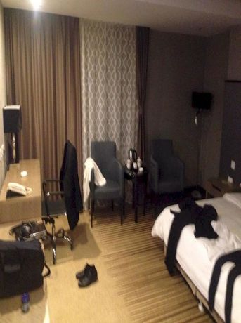 Imagen de la habitación del Hotel Sunny Resort - Dandong. Foto 13