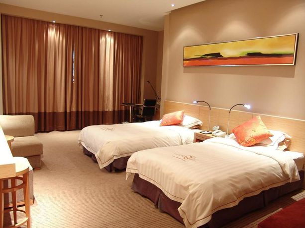 Imagen de la habitación del Hotel Sunny Resort - Dandong. Foto 15