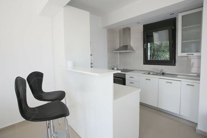Imagen de la habitación del Hotel Sunny Sani Luxury Villas. Foto 18