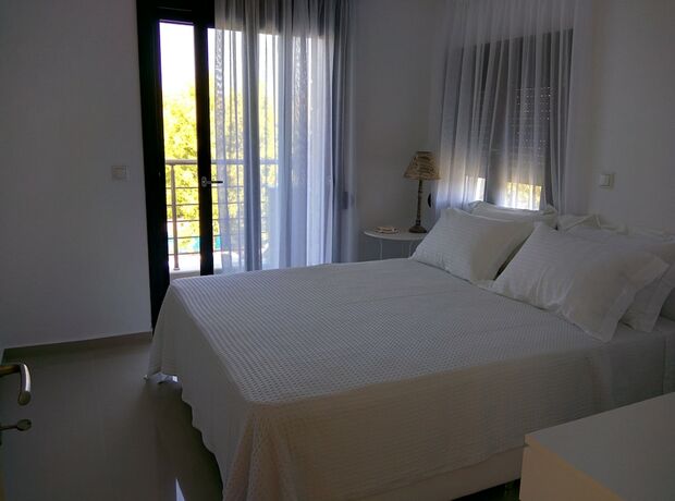 Imagen de la habitación del Hotel Sunny Sani Luxury Villas. Foto 20