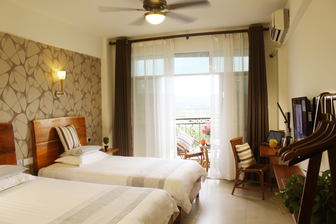 Imagen de la habitación del Hotel Sunny Sanya Destination Haitang. Foto 12