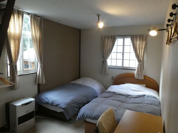Imagen de la habitación del Hotel Sunny Side Hut. Foto 28