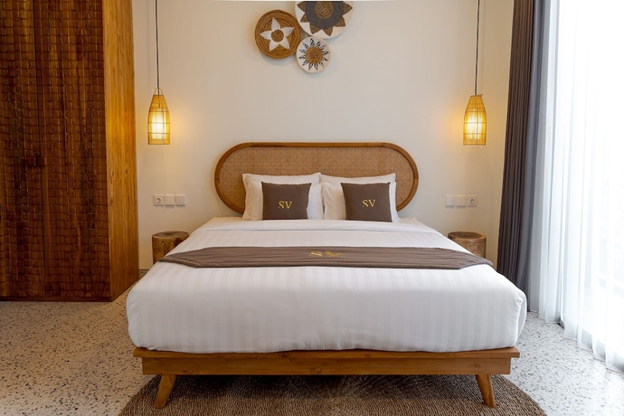 Imagen de la habitación del Hotel Sunny Village Batu Bolong. Foto 2