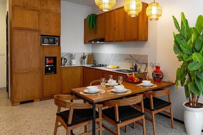 Imagen de la habitación del Hotel Sunny Village Batu Bolong. Foto 5