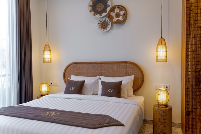 Imagen de la habitación del Hotel Sunny Village Batu Bolong. Foto 6