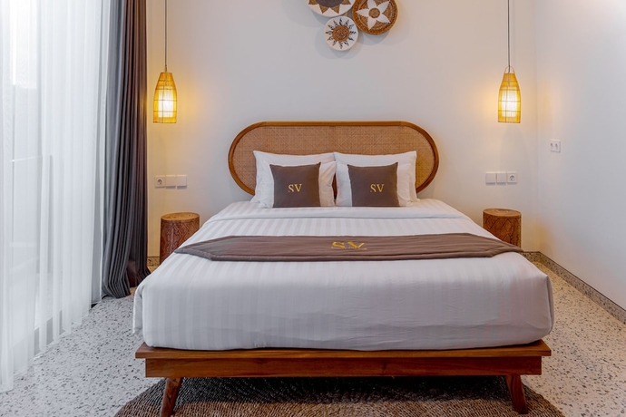 Imagen de la habitación del Hotel Sunny Village Batu Bolong. Foto 8