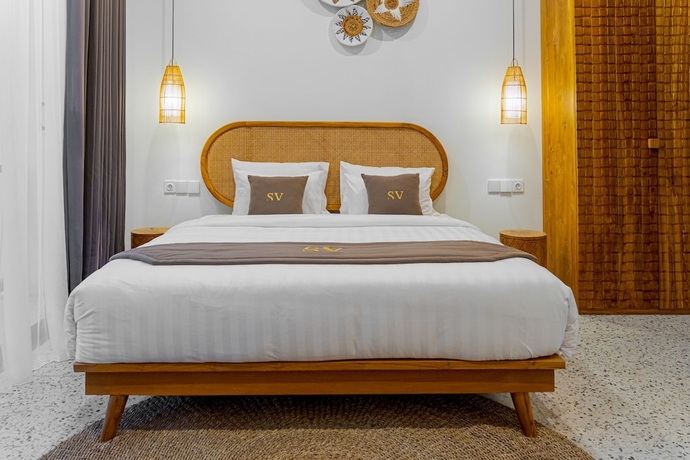 Imagen de la habitación del Hotel Sunny Village Batu Bolong. Foto 11