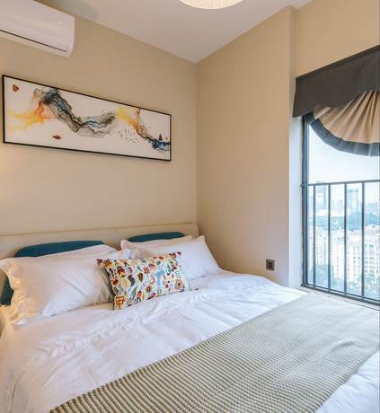 Imagen de la habitación del Hotel Sunnyrain Apartment. Foto 2