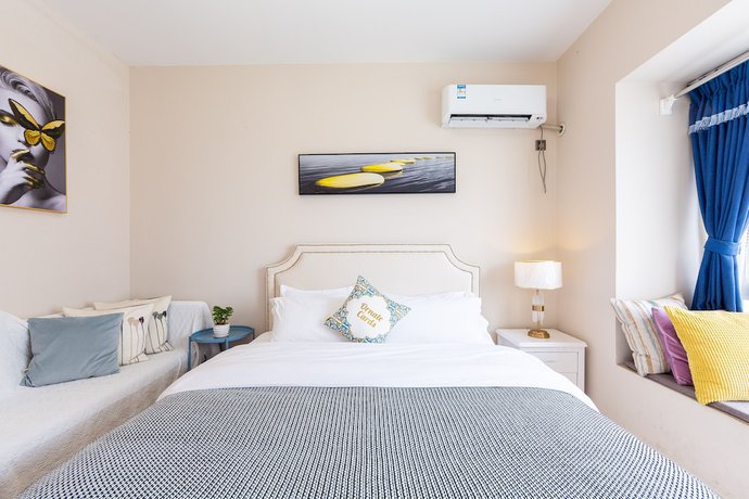 Imagen de la habitación del Hotel Sunnyrain Apartment. Foto 3