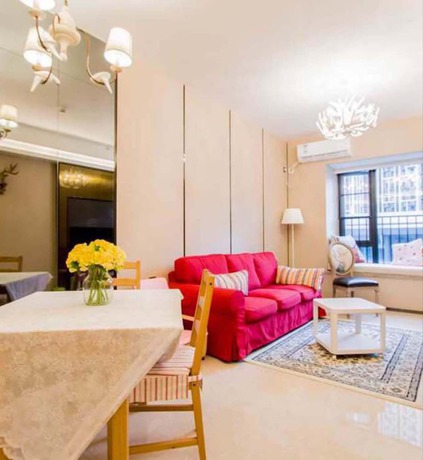 Imagen de la habitación del Hotel Sunnyrain Apartment. Foto 5