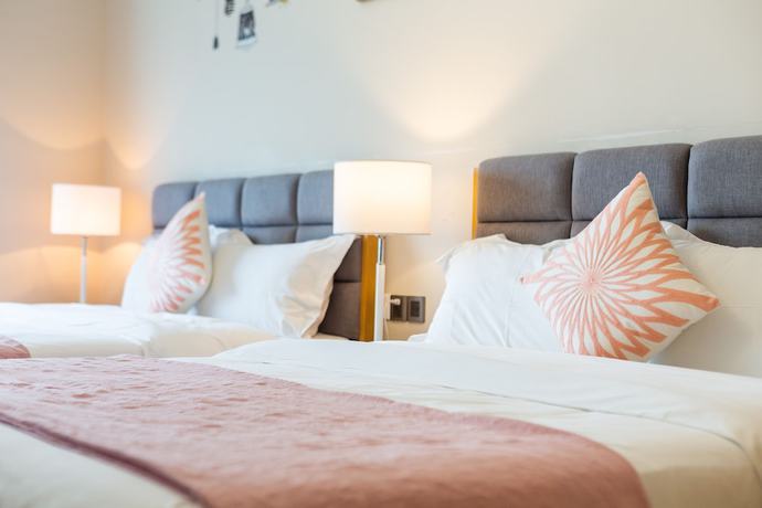 Imagen de la habitación del Hotel Sunnyrain Apartment. Foto 9