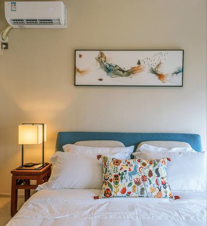 Imagen de la habitación del Hotel Sunnyrain Apartment. Foto 14